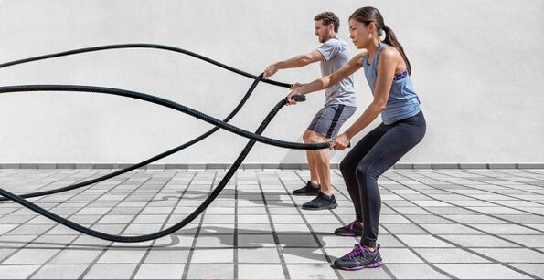 Man and woman are doing exercises
